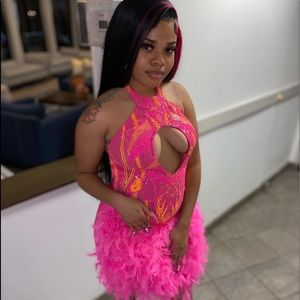 Beautiful pink, feathered, and sequined dress